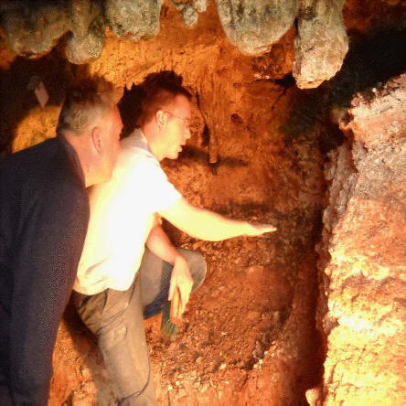 The cave has filled up over many thousands of years. Beneath a thin crust of lime which has dripped and accumulated from the cave roof is a breccia deposit of soil and stone deposited during post-glacial cold tundra conditions 11-14,000 years ago,. 