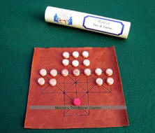 Fox and Geese - replica medieval leather board with wooden pieces